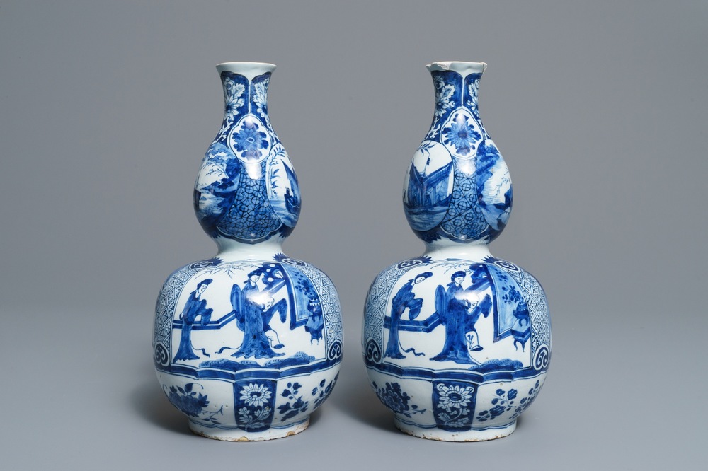 A pair of Dutch Delft blue and white double gourd chinoiserie vases, 18th C.